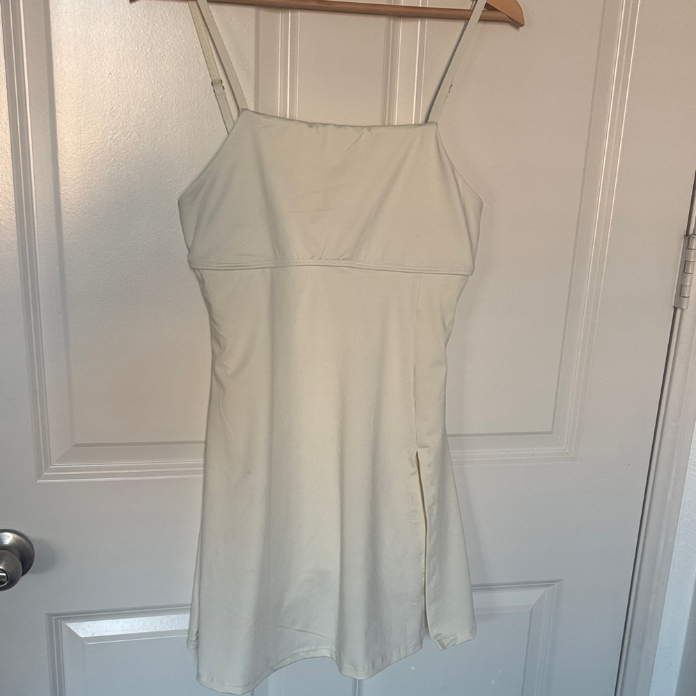 Sporty Cream Mini Slip Dress with Adjustable Spaghetti Straps and shorts built